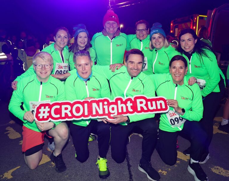Photograph of people smiling at Croí Night Run