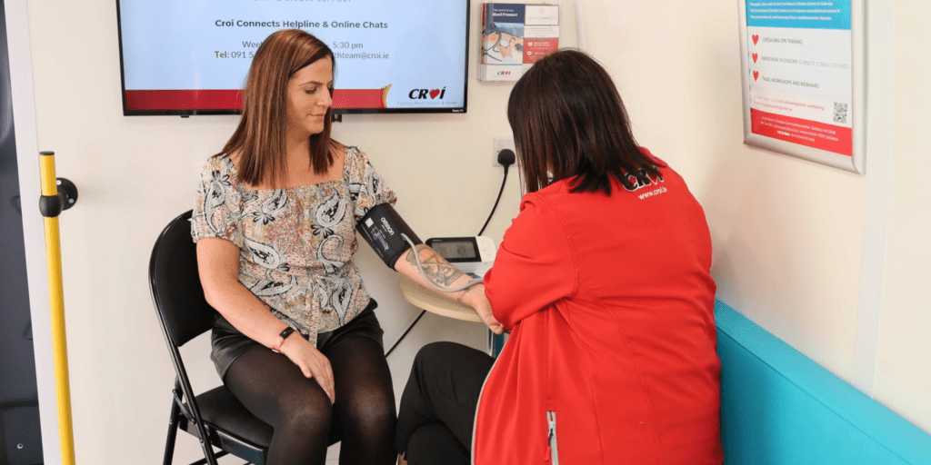 Croí nurse doing a blood pressure check