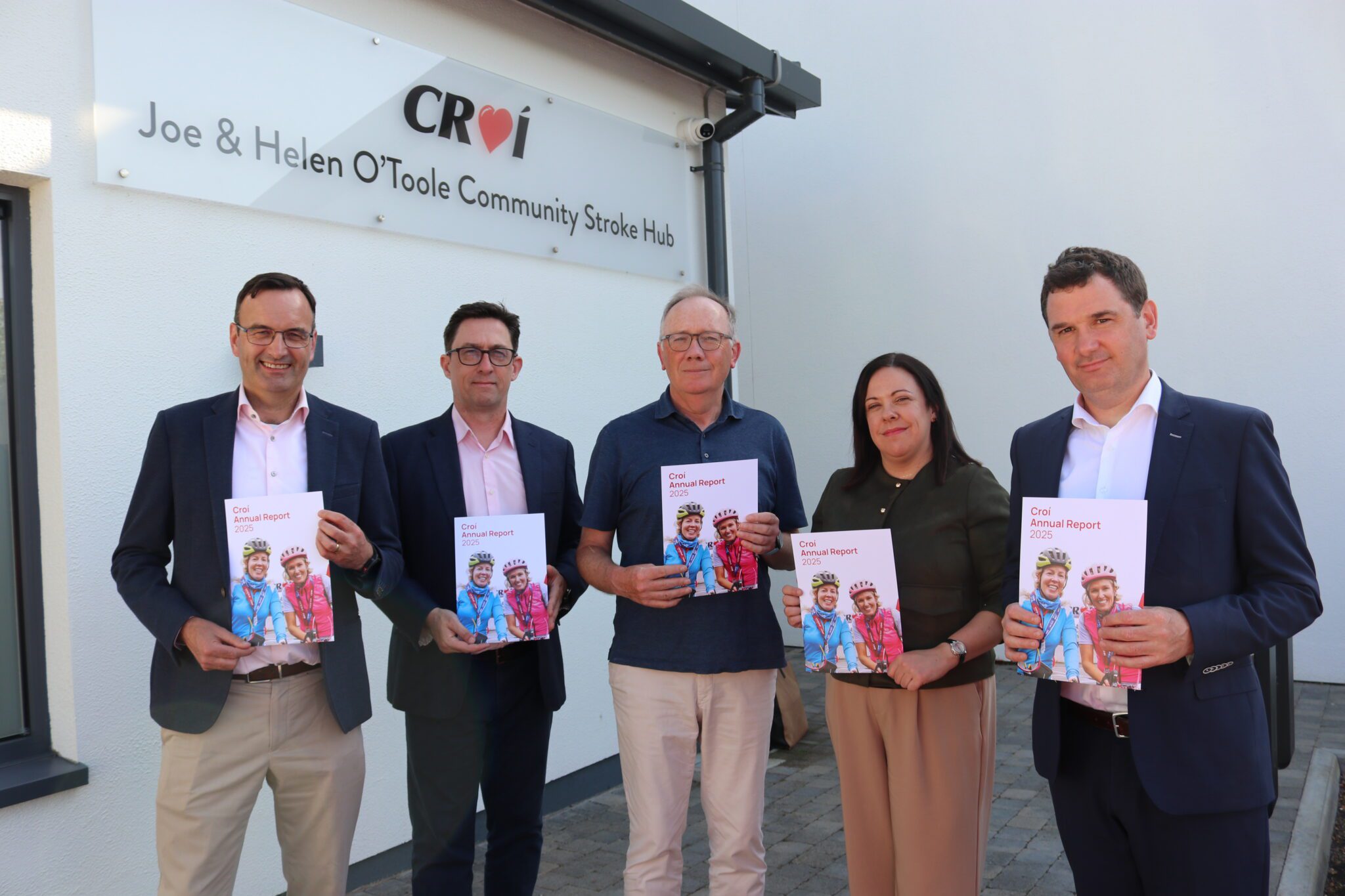 Croí CEO and Board Members holding Croí's 2025 Annual Report